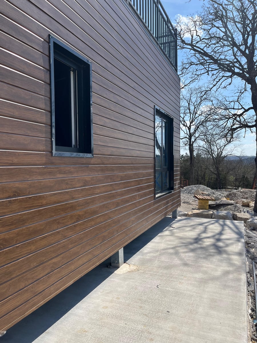 Installed cladding reference for exterior finish, trim, openings, and buyer check