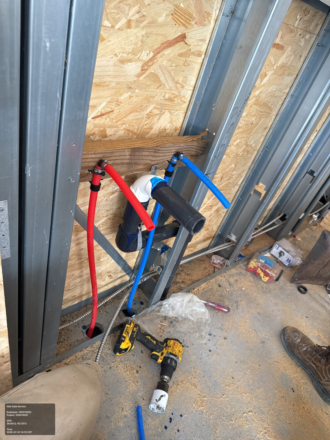 Hot and cold water lines within the steel wall system